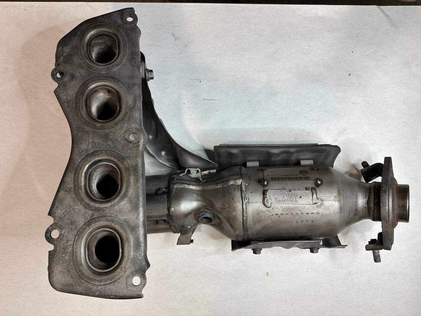 Catalytic Converter with Integrated Exhaust Manifold, Federal