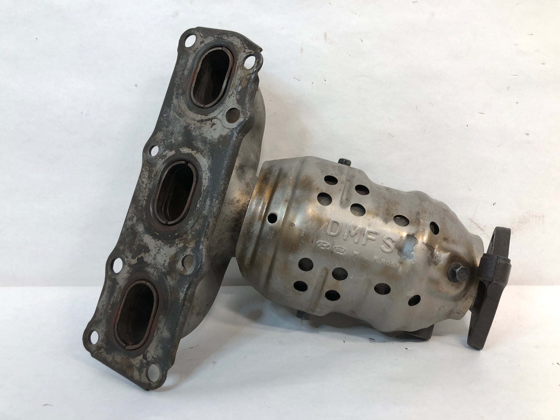 Left, Catalytic Converter with Integrated Exhaust Manifold