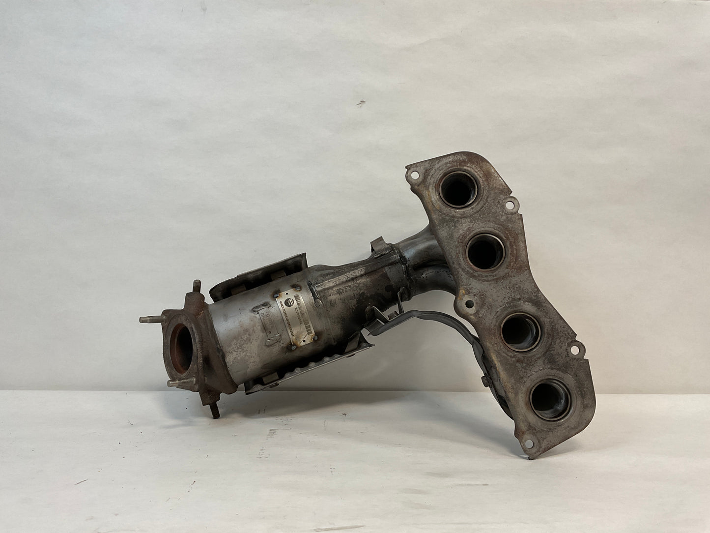 Catalytic Converter with Integrated Exhaust Manifold, Federal