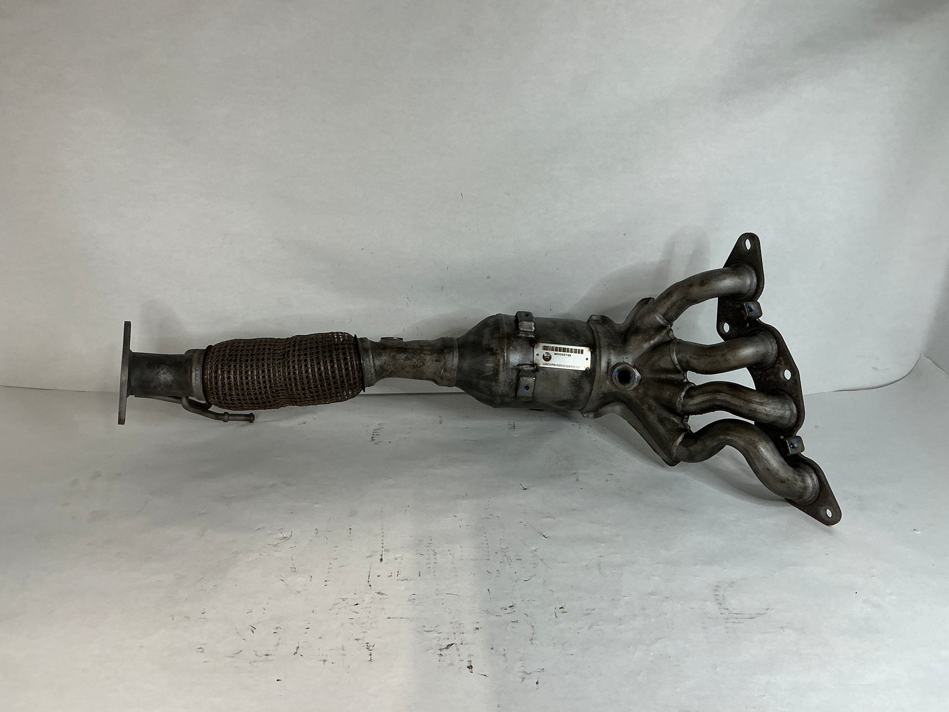 	Exhaust Manifold, Exhaust Manifold And Catalyst
Description:	
Focus. 2.0l. Without turbo. With pzev. 2.0L dohc, california.

Replaces:	cv6z5g232a