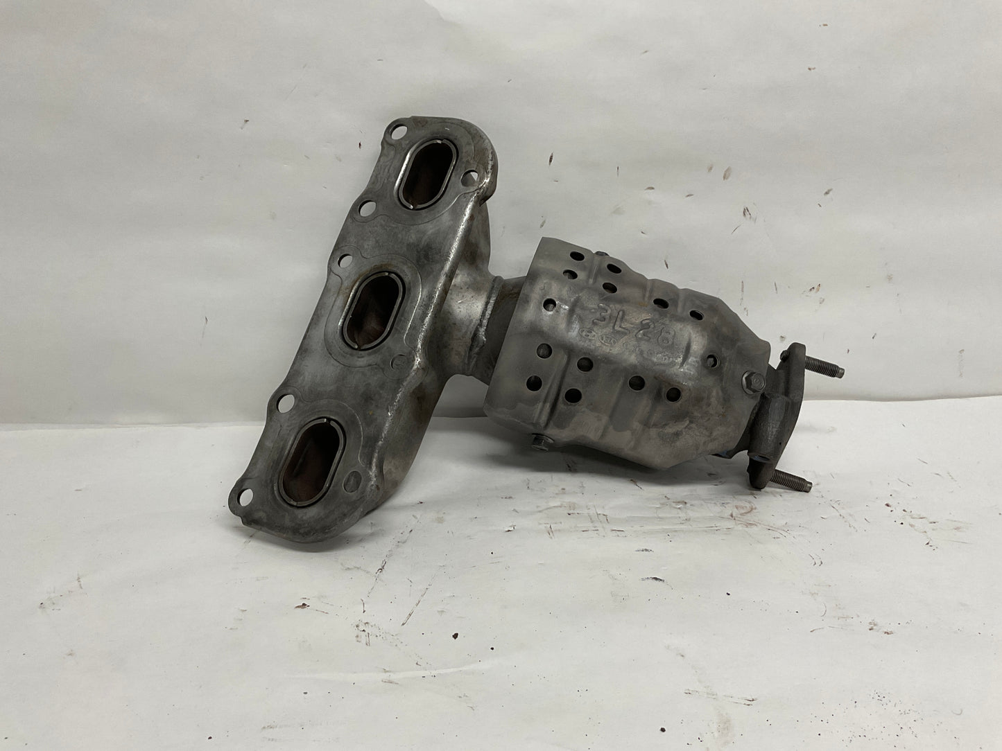 Right, Catalytic Converter with Integrated Exhaust Manifold
