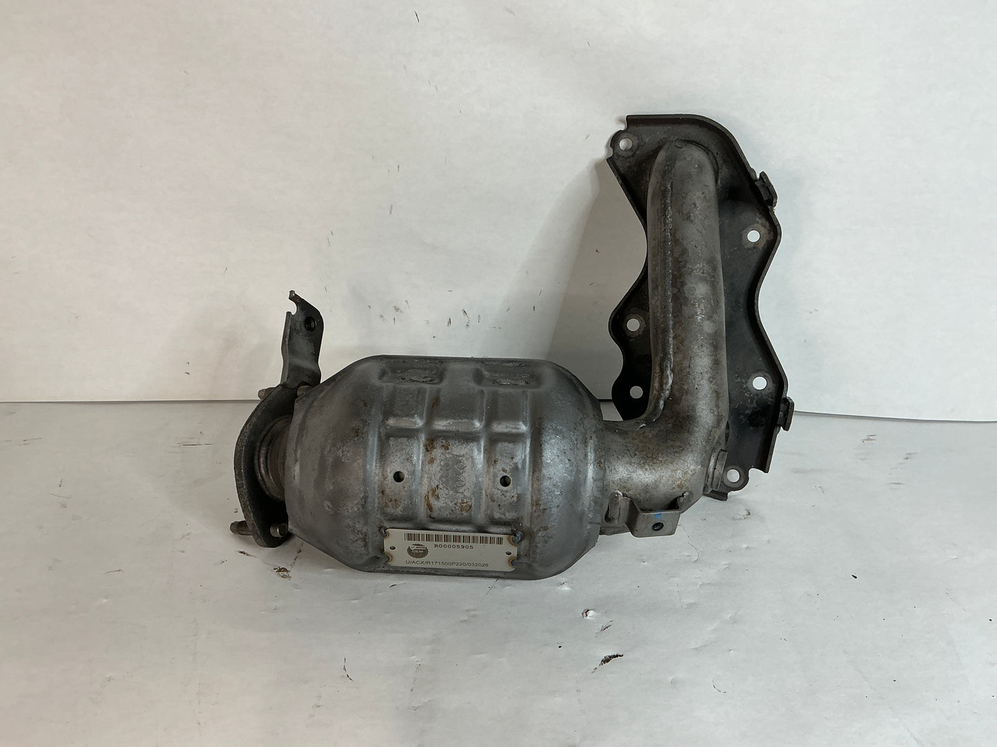 Left, Catalytic Converter with Integrated Exhaust Manifold
