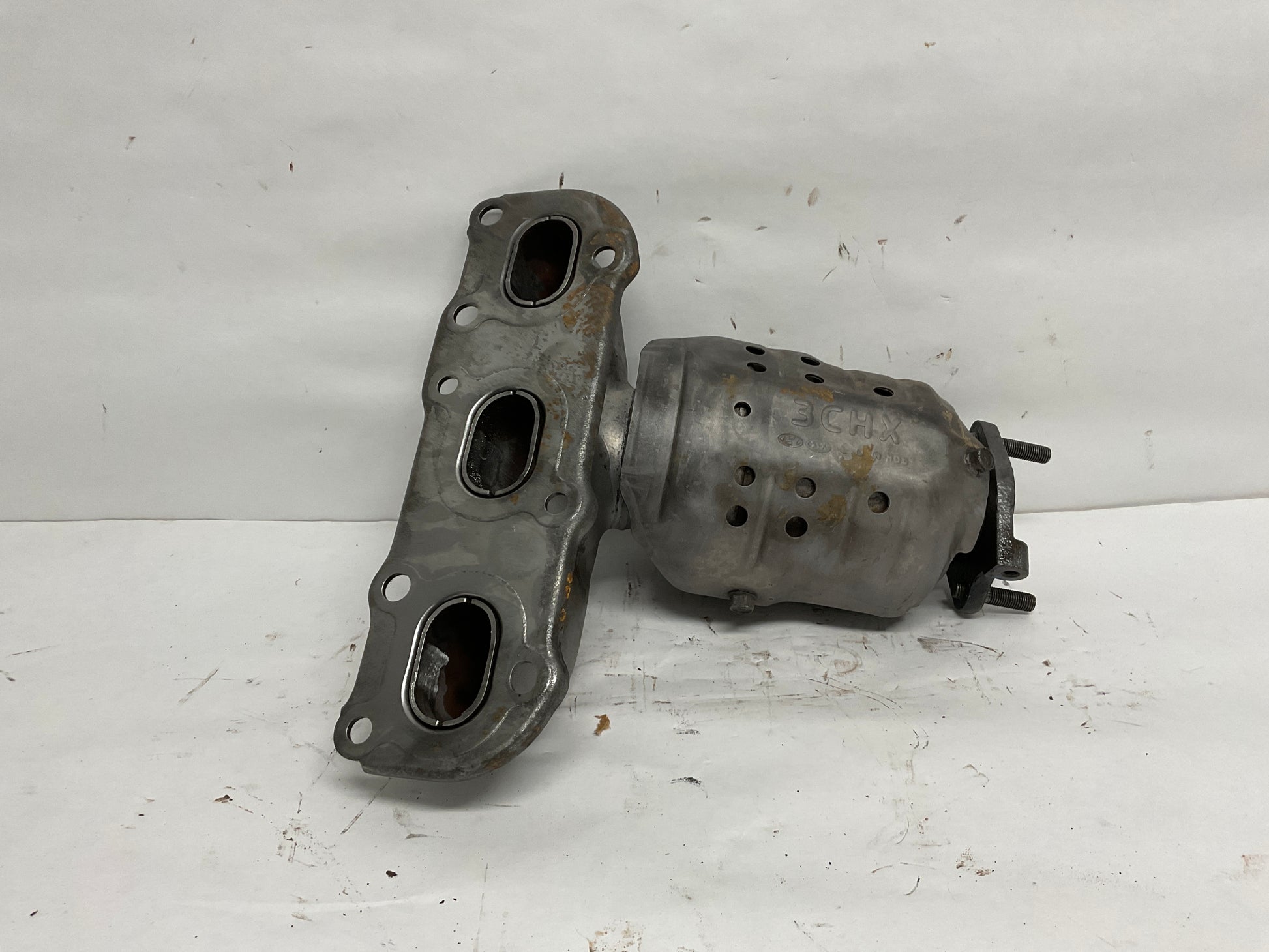 Right, Catalytic Converter with Integrated Exhaust Manifold