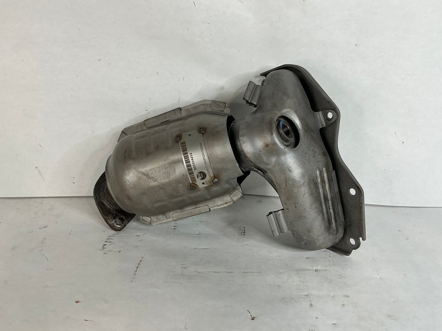 Right, Catalytic Converter with Integrated Exhaust Manifold